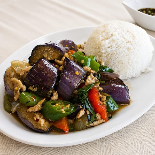 84. Thai Basil Eggplant Over Rice.