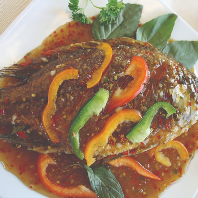 64. Tilapia over Thai Chili Sauce.